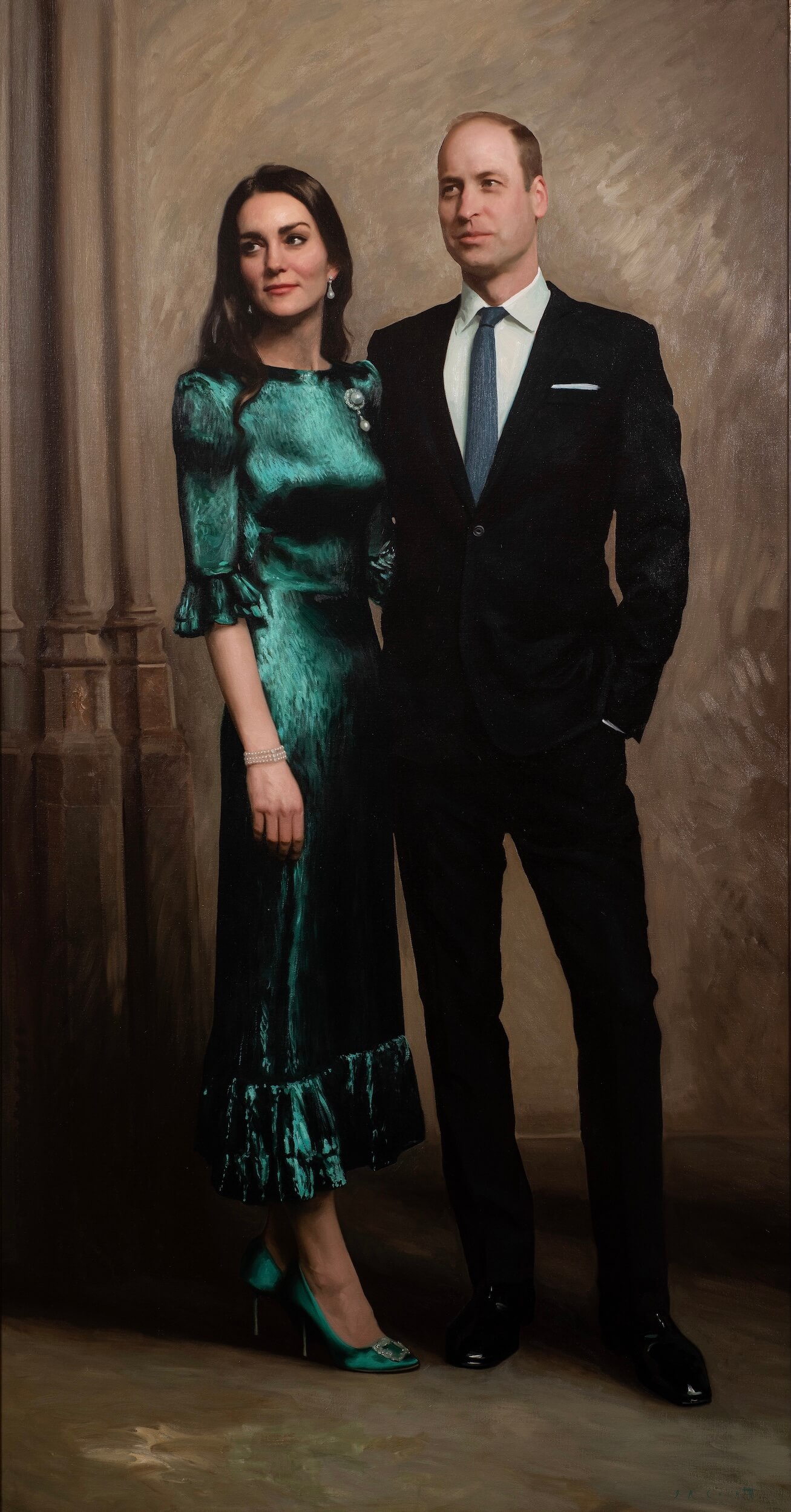Painting of TRH Prince and Princess of Wales, standing amongst a dark grey/dark cream coloured background, with Princess Kate wearing an Emerald dress, diamond earrings and matching bracelet, while the Prince wears a navy suit with a white shirt and lighter blue tie