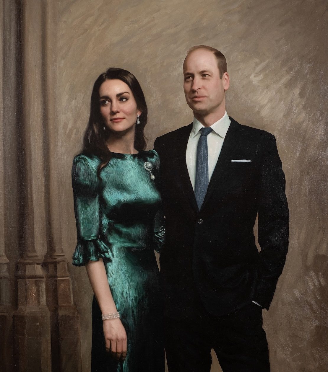 Painting of TRH Prince and Princess of Wales, standing amongst a dark grey/dark cream coloured background, with Princess Kate wearing an Emerald dress, diamond earrings and matching bracelet, while the Prince wears a navy suit with a white shirt and lighter blue tie